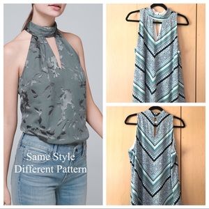 WHBM SLEEVELESS BLOUSE WITH KEY HOLE NECK SIZE L